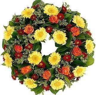 Траурный венок из Гербер и Роз «Вечный огонь» Траурный венок из Гербер и Роз «Вечный огонь»